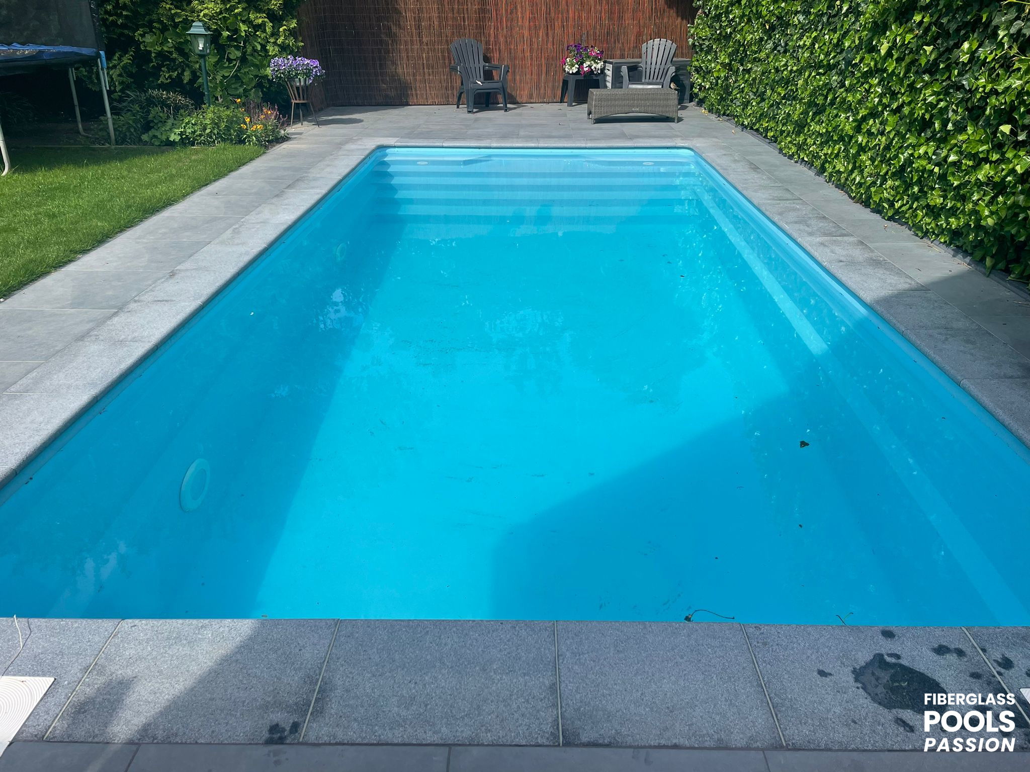Fiberlass pool blue with perfect water and terrace