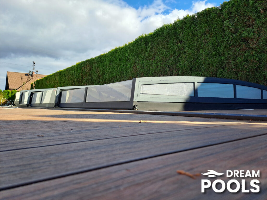 Composite decking around fiberglass pool from DreamPools. Maintaining a Fiberglass Pool with Saltwater