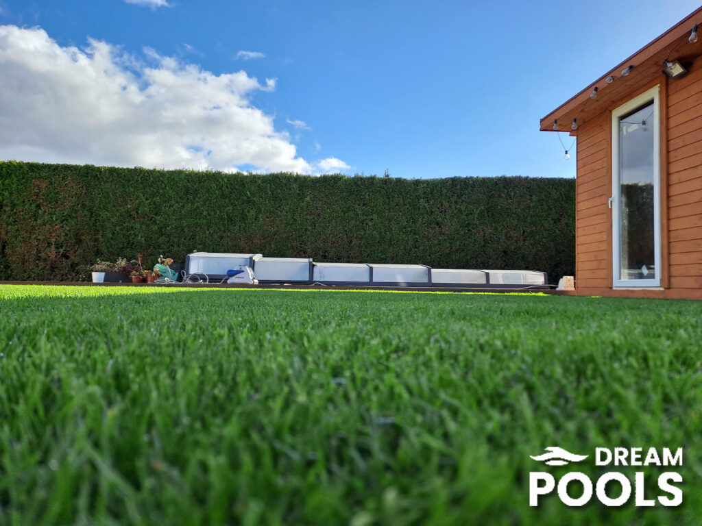 Grass around fiberglass pool