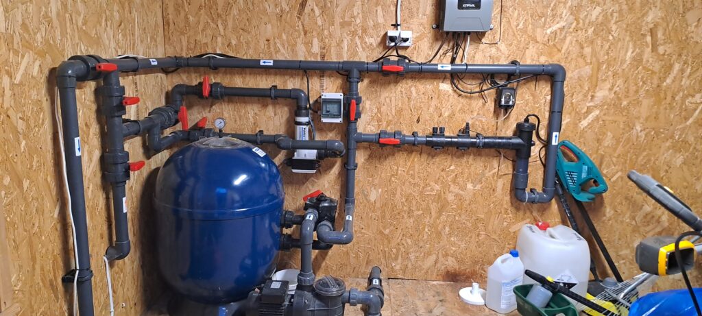 Technical room made of concrete blocks behind the pool 